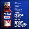NyQuil bottle with a red cap on a white background
