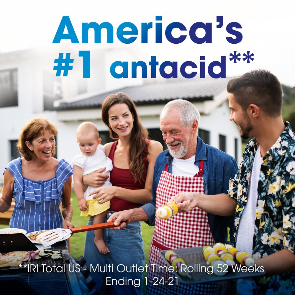 Family gathered around a grill with text claiming to be 'America's #1 antacid'.