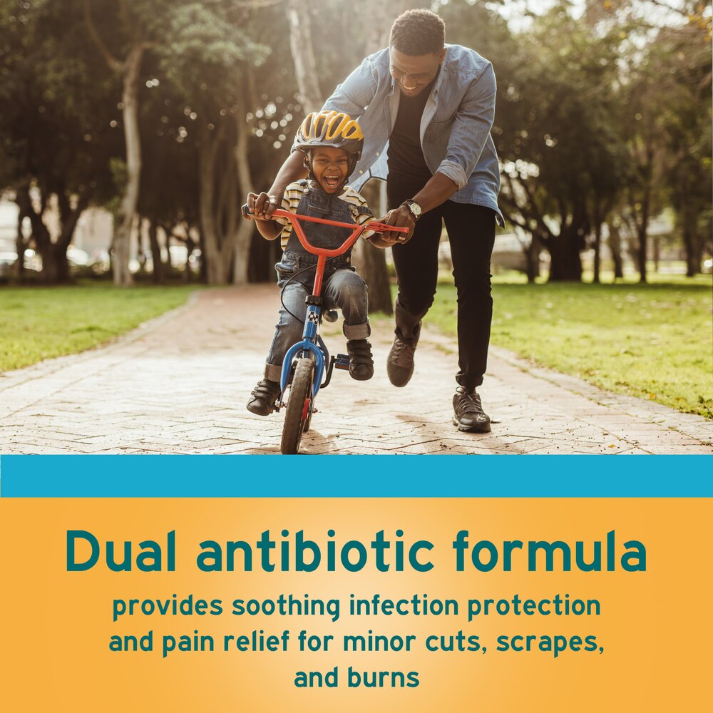 Man teaching a child to ride a bike in a park with a product advertisement overlay.