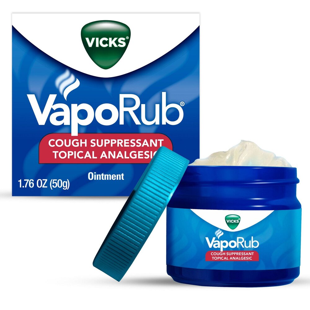 Vicks VapoRub jar and packaging on a white background