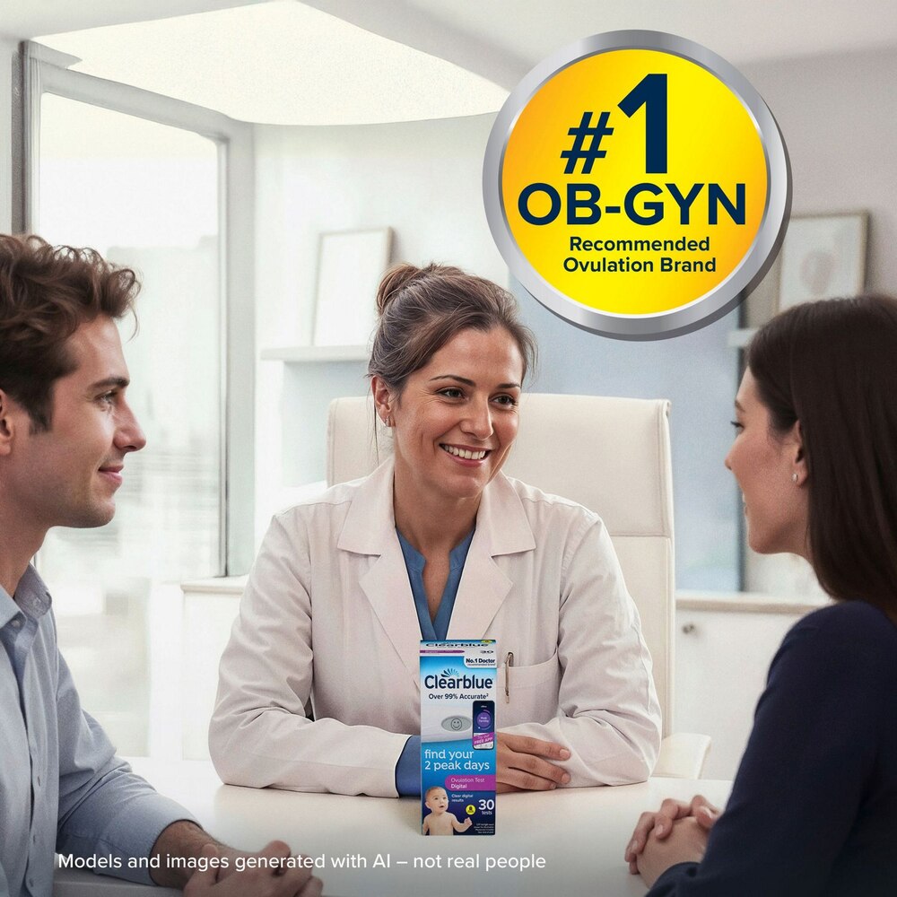 Doctor with a patient in an office setting, holding ClearBlue ovulation test kit.