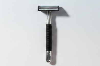 Gillette Fusion5 razor and packaging on a white background